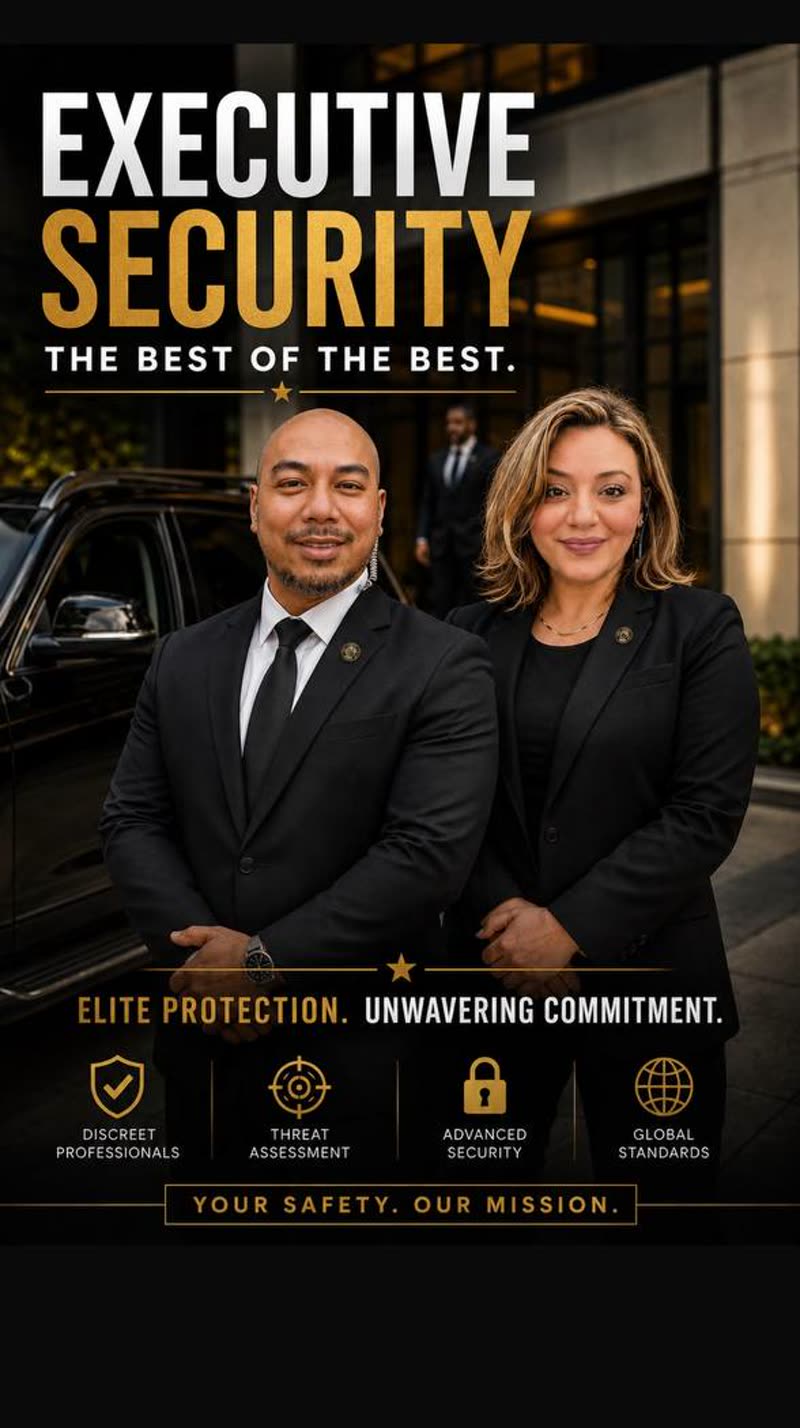 Red River executive protection detail beside a black SUV